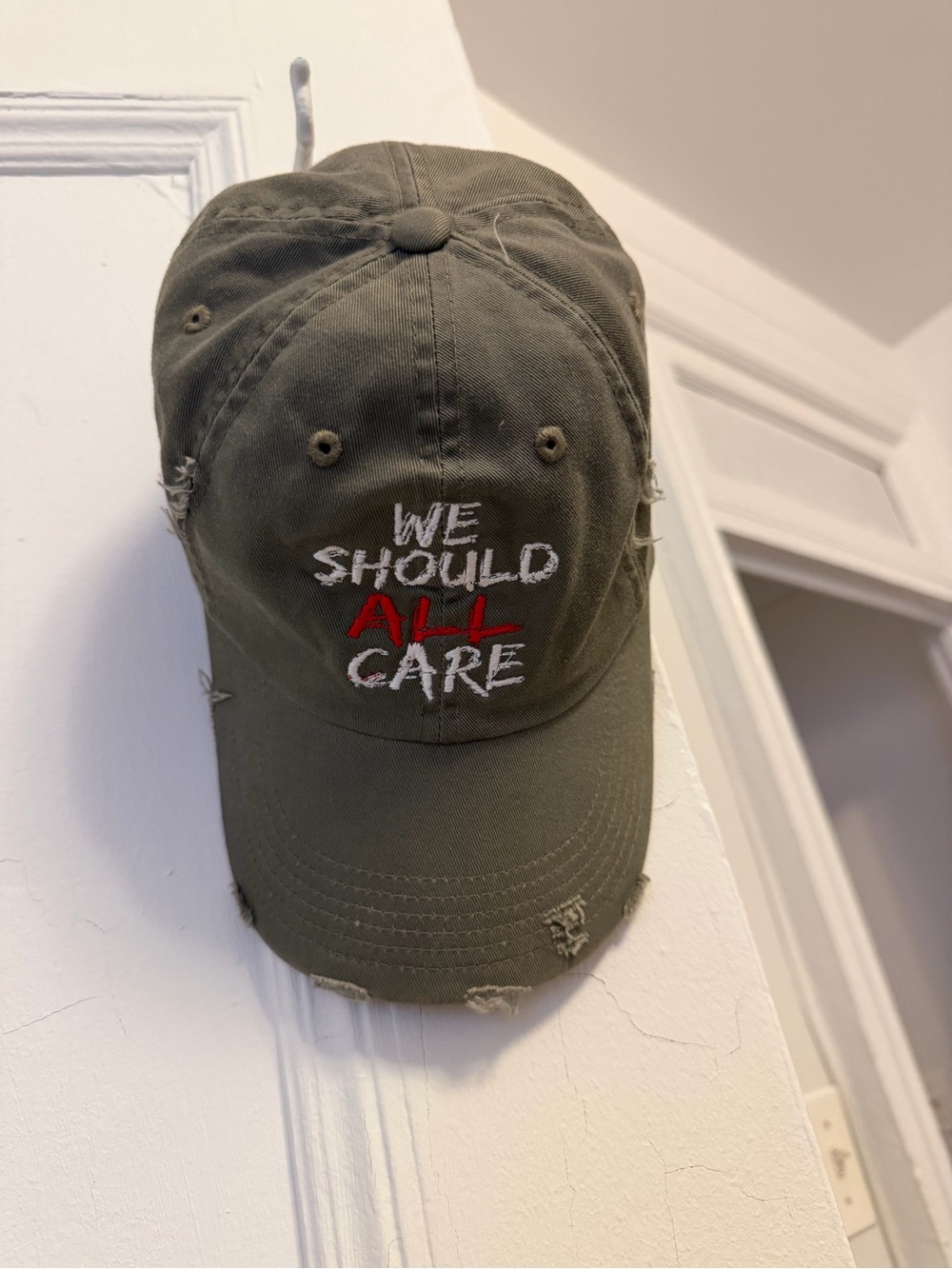 ‘We Should All Care’ Distressed Olive Green Embroidered Cap